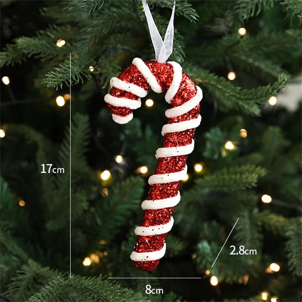 Red glittery candy cane ornament with white stripes on a Christmas tree, showing measurements.