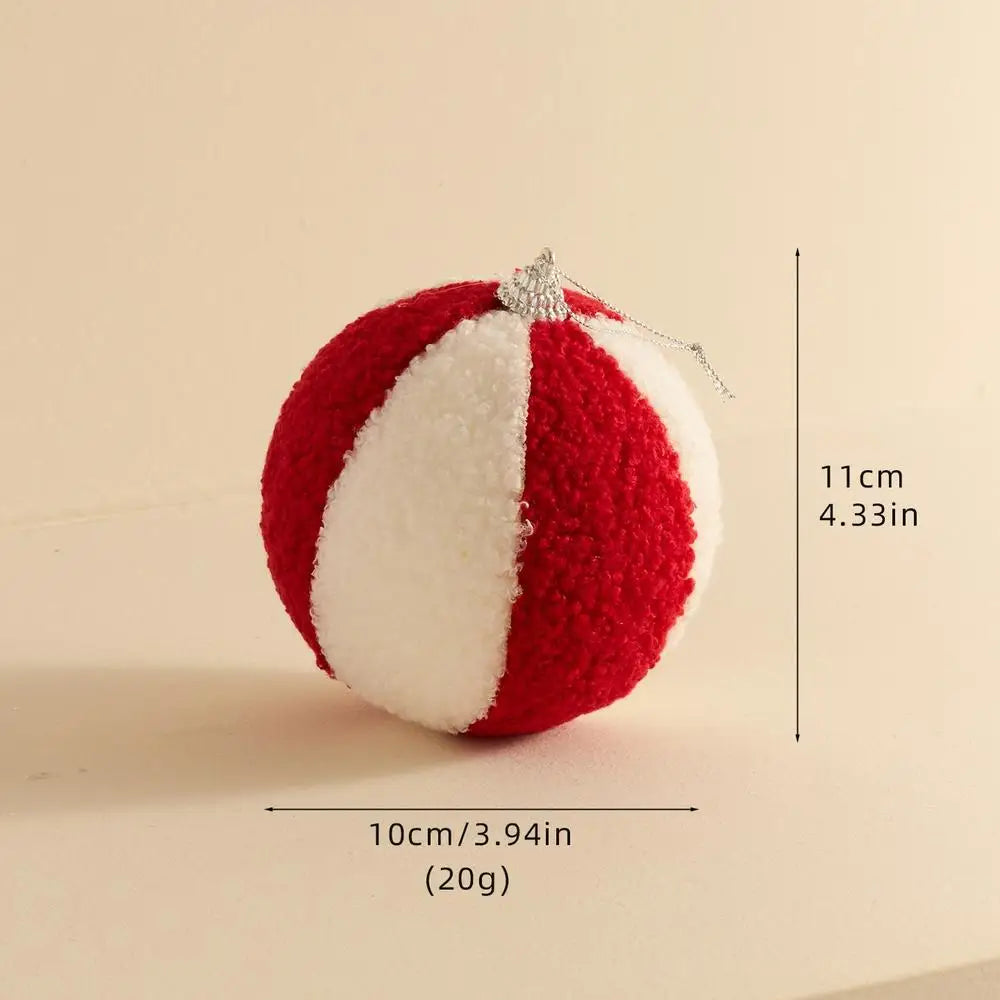 Red and white striped ball with measurements on a beige background