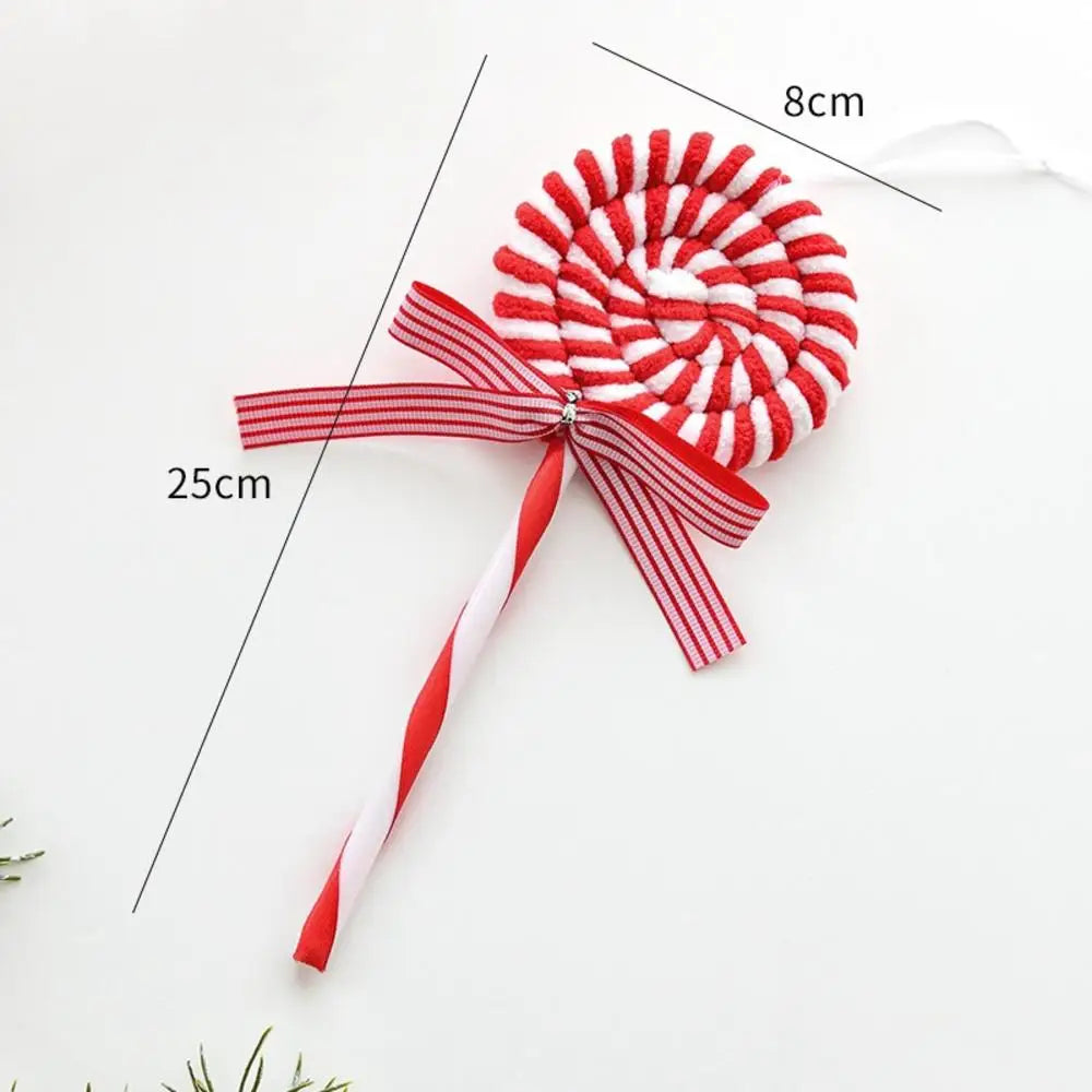 Red and white striped candy cane-shaped lollipop with measurements on a light background