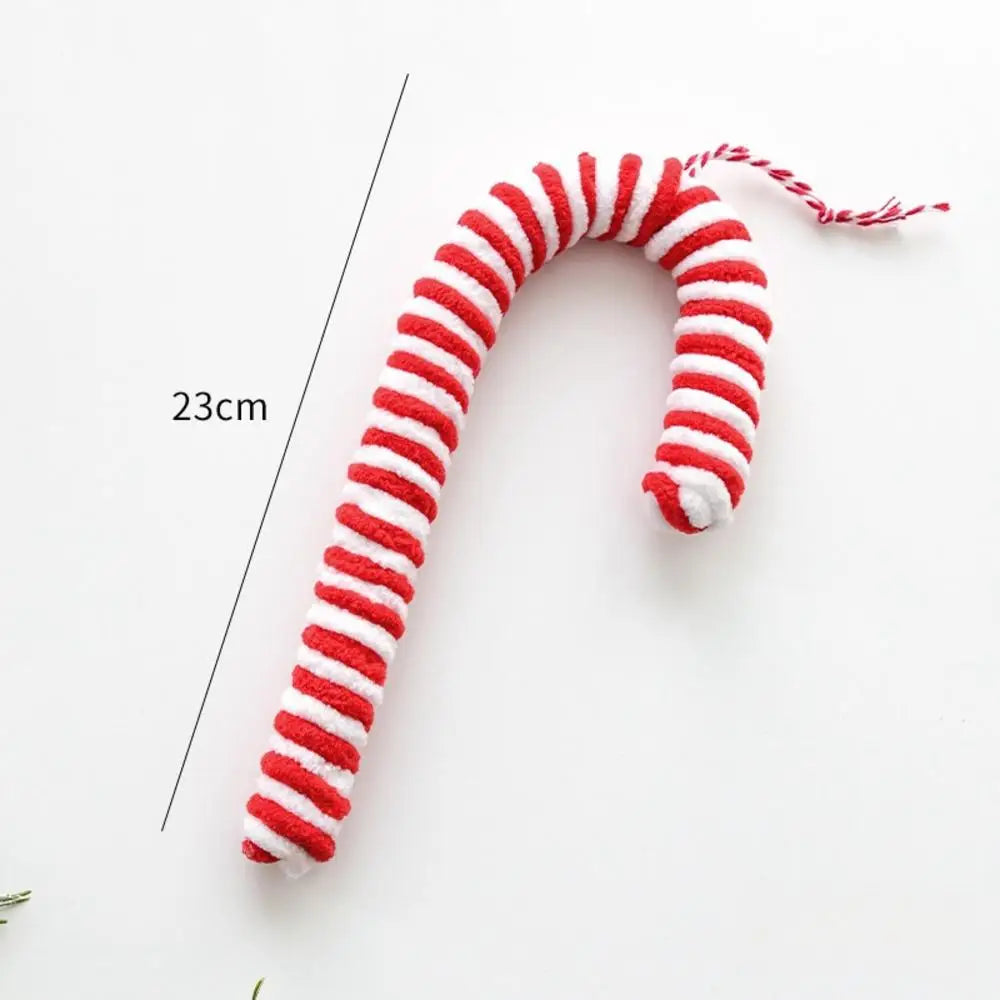 Red and white striped candy cane toy on a white background with measurement text.