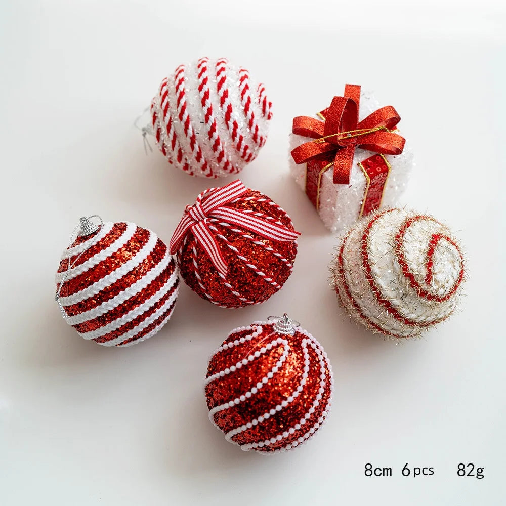 Set of red and white Christmas ornaments on a light background