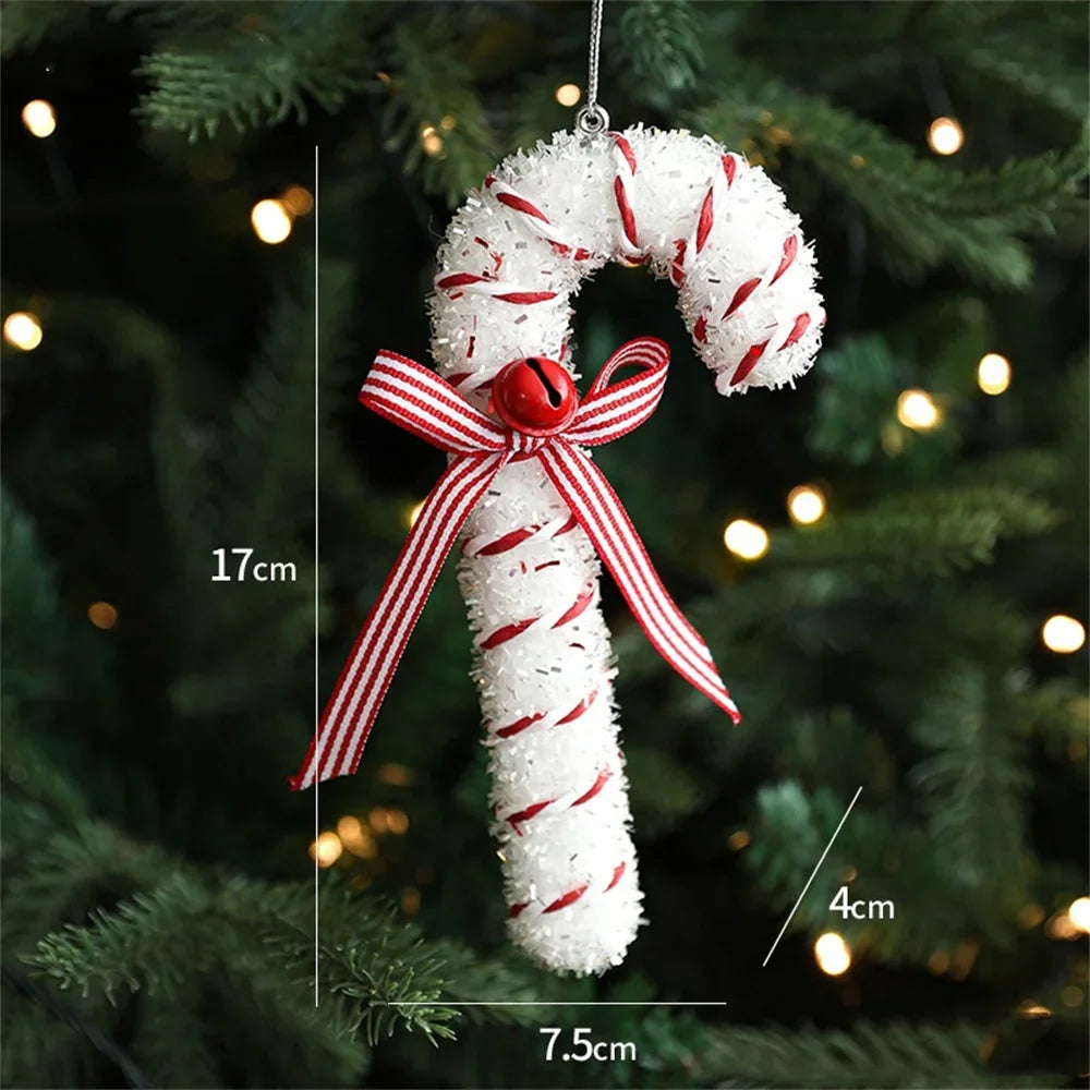 Decorative candy cane ornament with a red bow on a Christmas tree, showing measurements.
