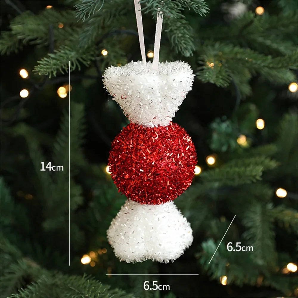 Decorative ornament with red and white glittery spheres on a Christmas tree.