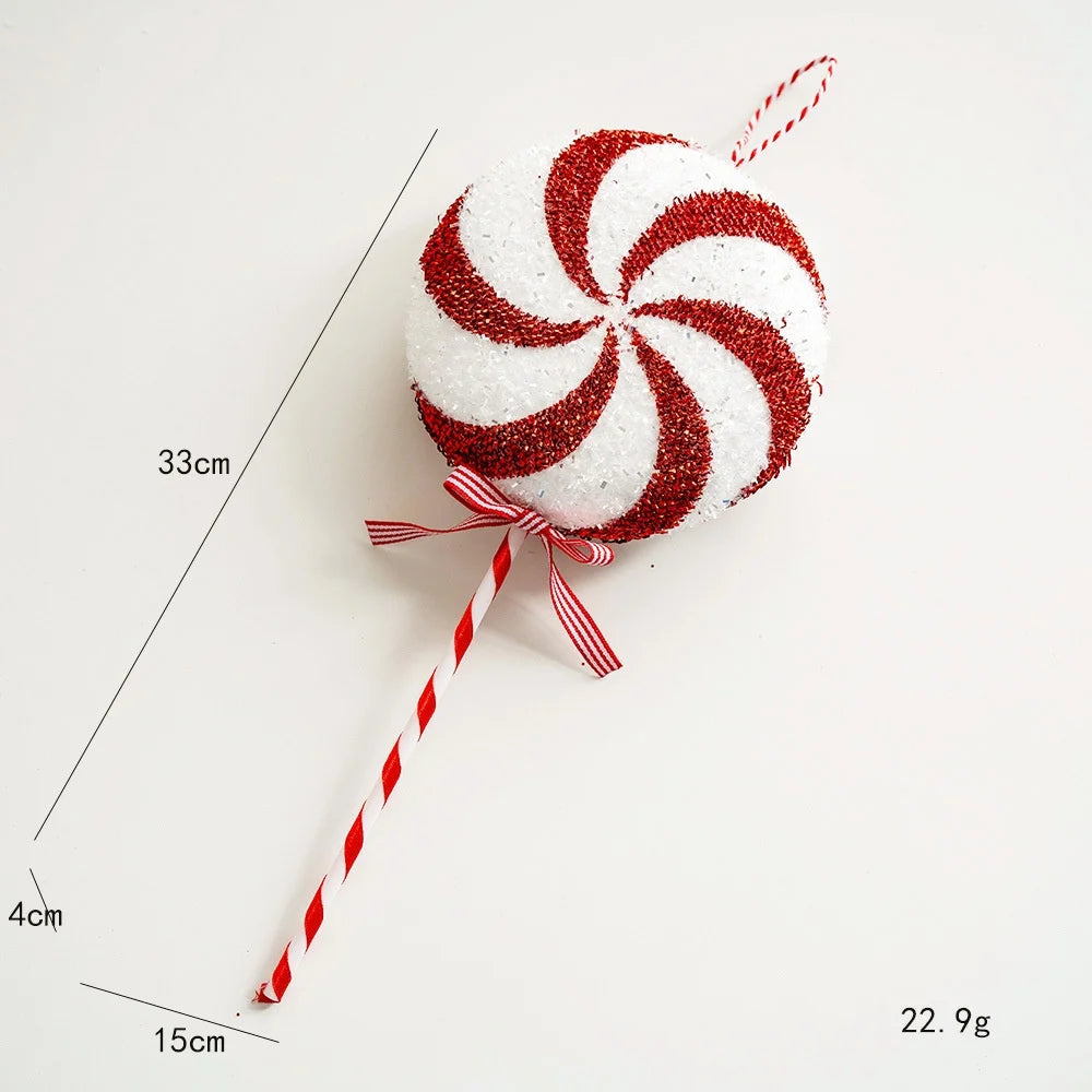 Red and white striped lollipop-shaped ornament with measurements on a white background