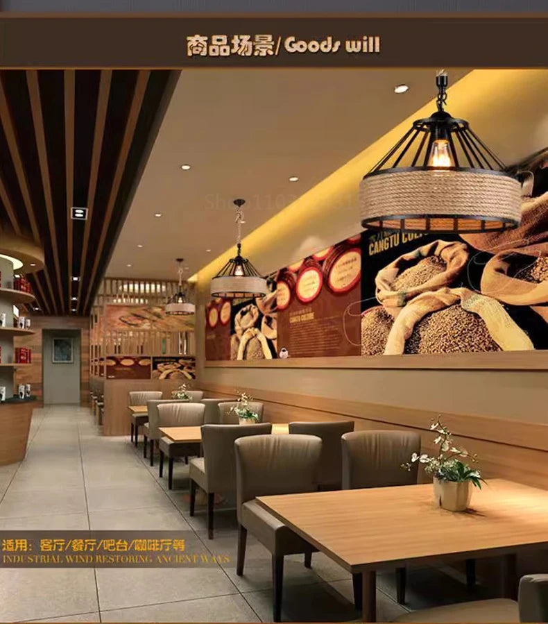 Modern restaurant interior with tables, chairs, and a large wall display.