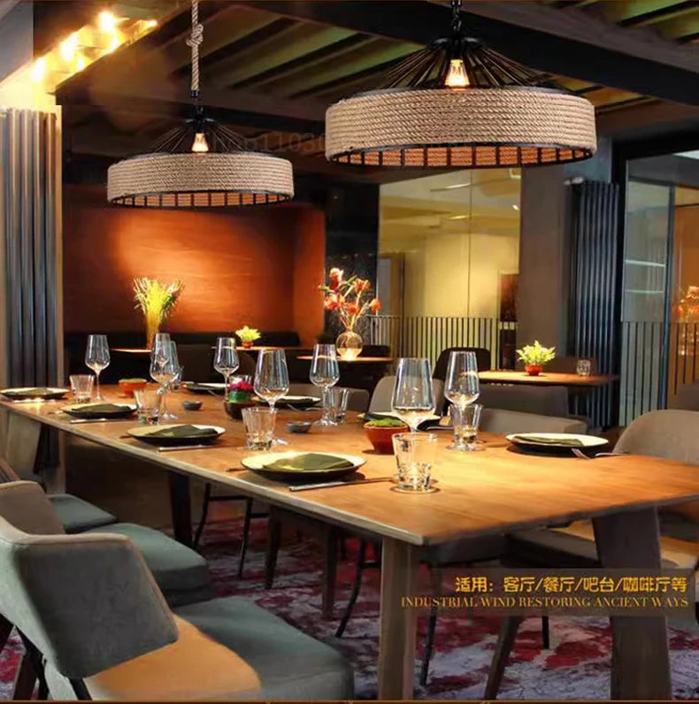 Dining area with wooden table, chairs, and decorative elements in a modern interior setting.