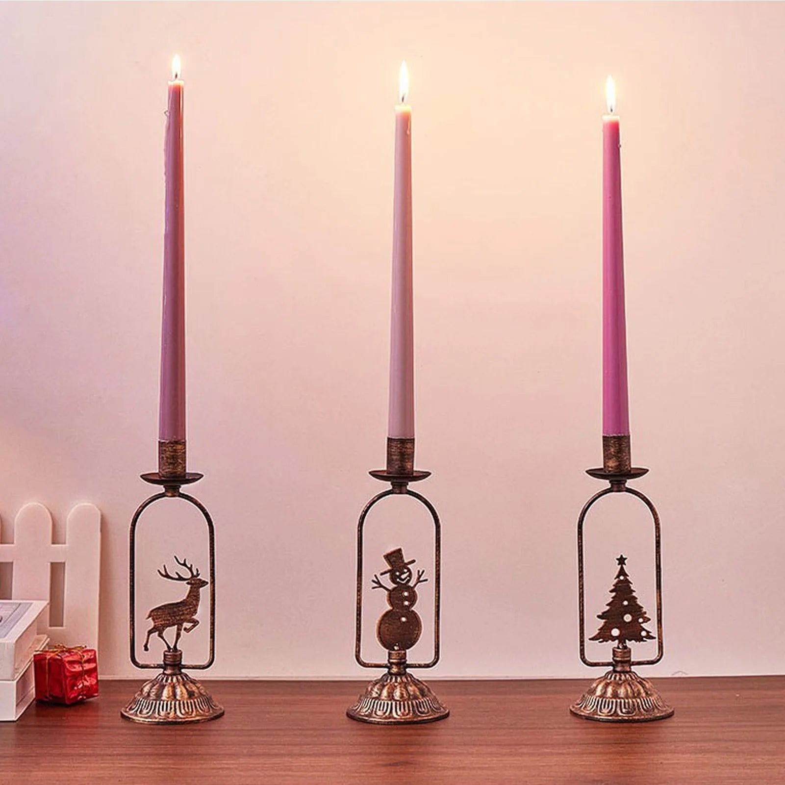 Set of 3 Iron Candle Holders with Christmas Tree, Snowman, and Deer designs in vintage bronze finish
