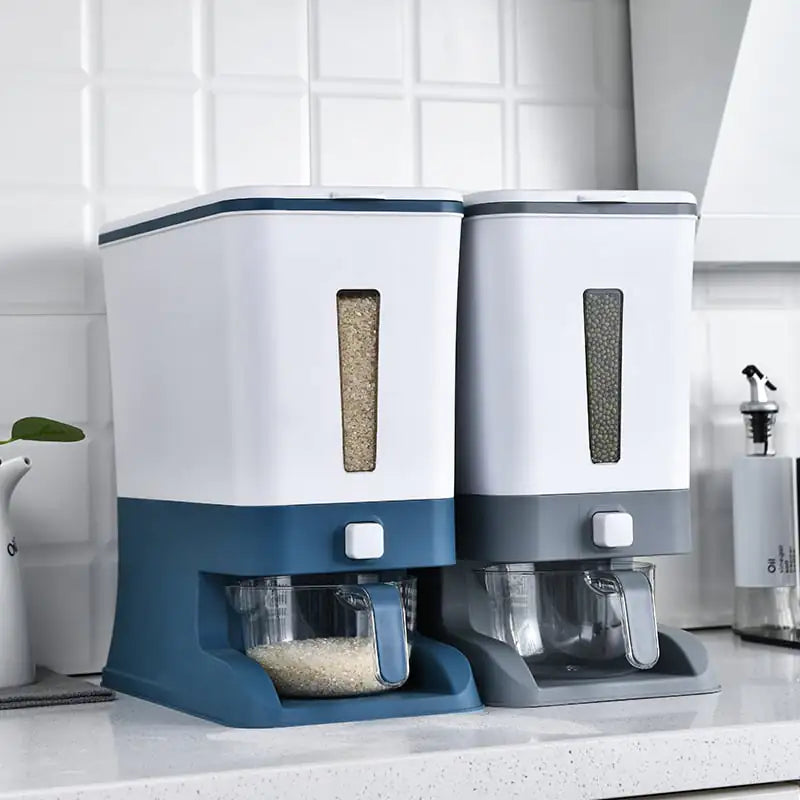 Two kitchen storage containers with blue and gray accents on a white countertop.