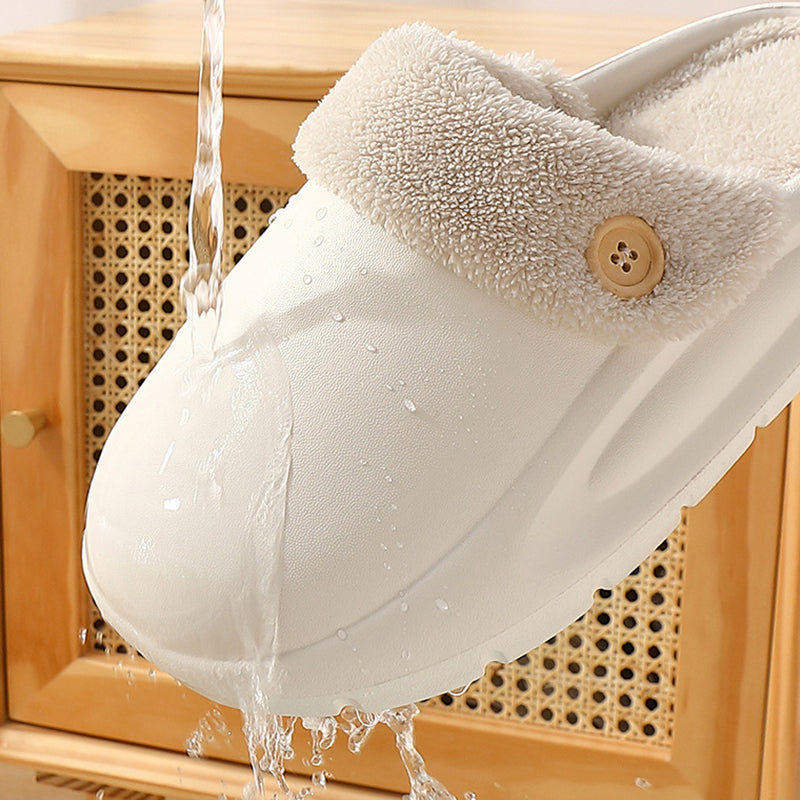 White shoe with fluffy lining being rinsed under water, wooden background