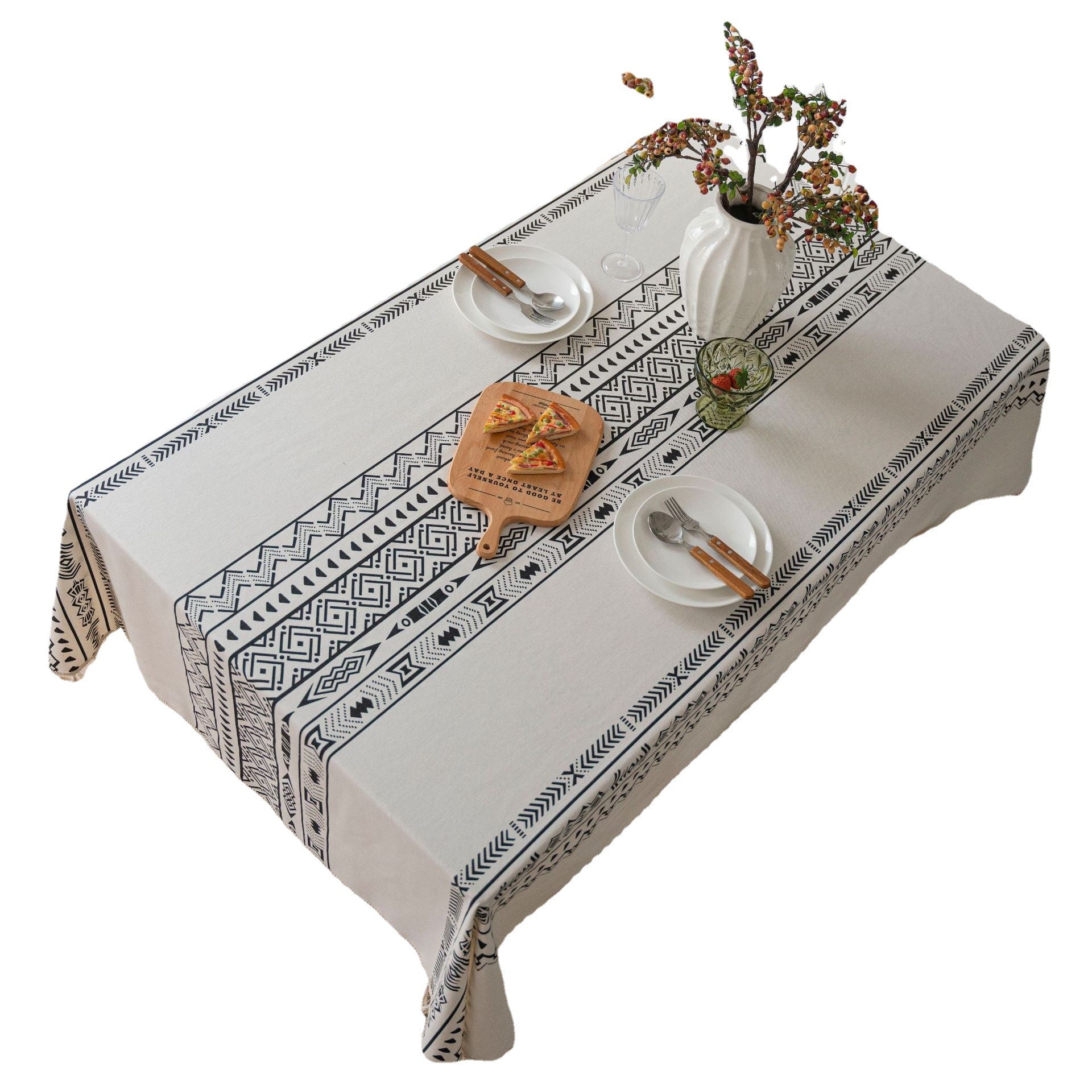 Tablecloth with geometric pattern on a white table setting