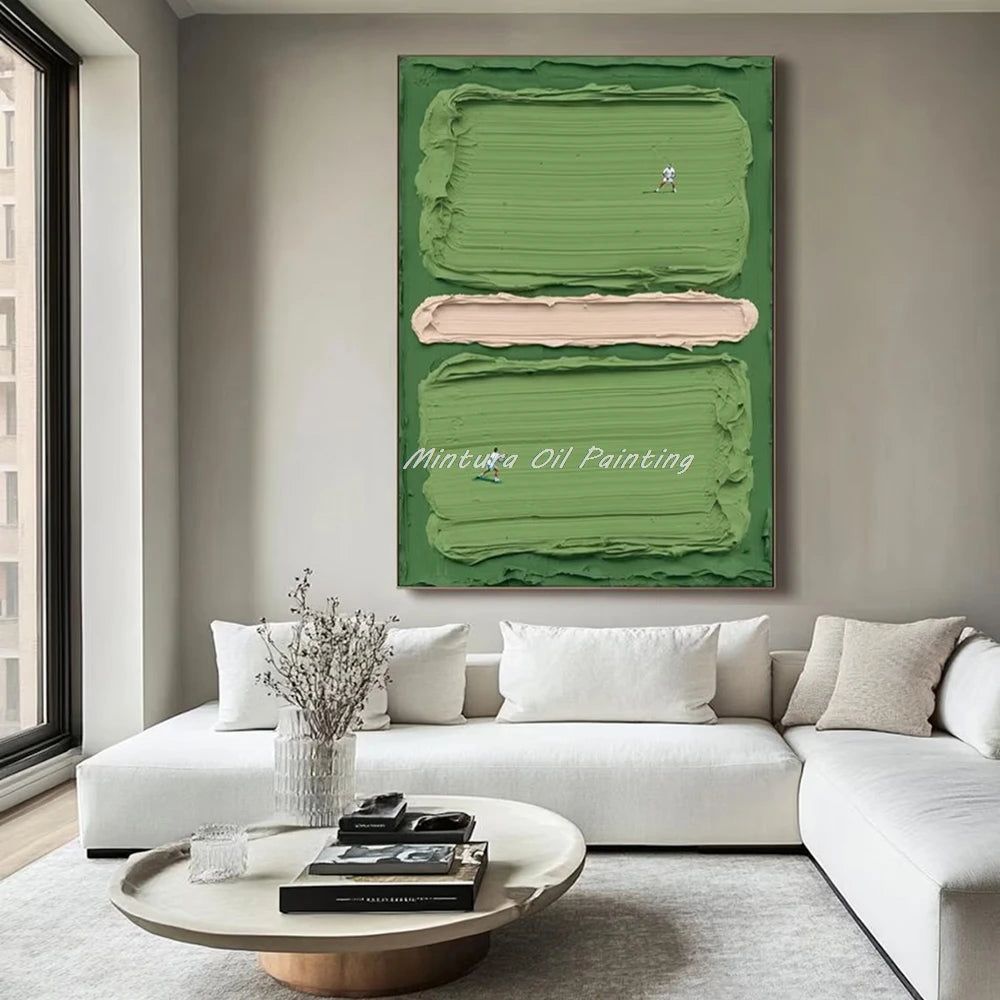 Green abstract painting of a tennis match on a wall above a white sofa in a modern living room.