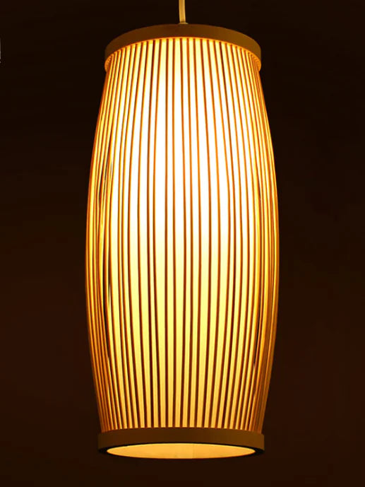 Wooden pendant lamp with a warm glow on a dark background