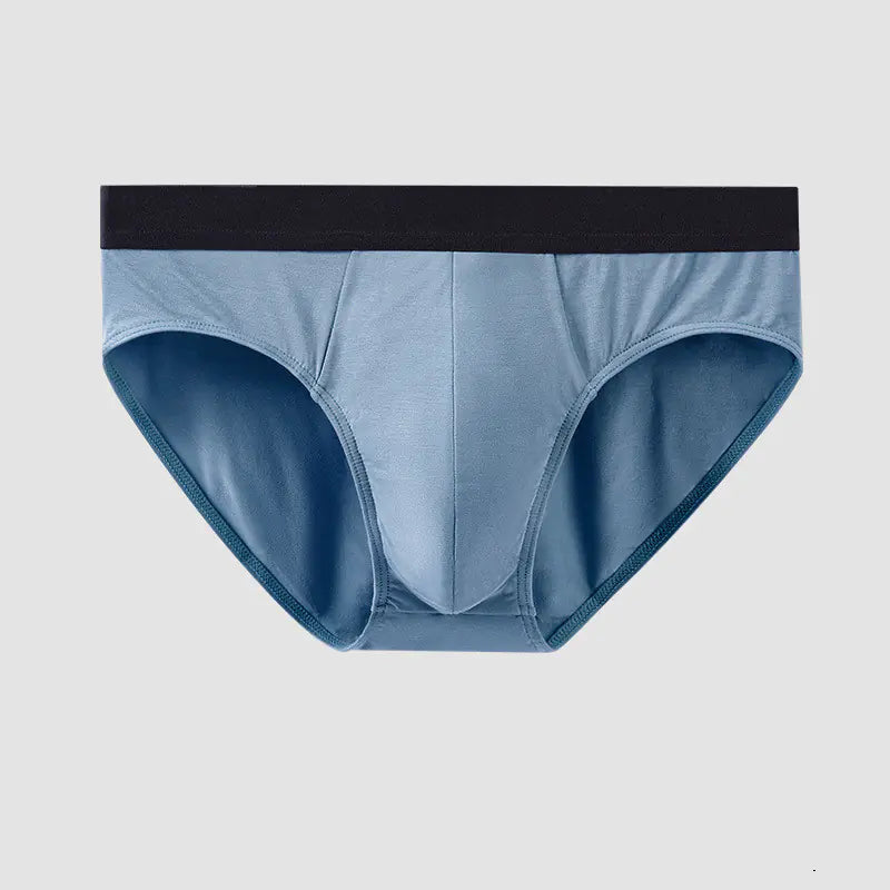 Blue men's underwear with black waistband on a light gray background
