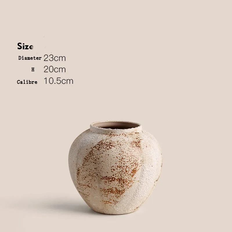 Ceramic vase with size specifications on a beige background