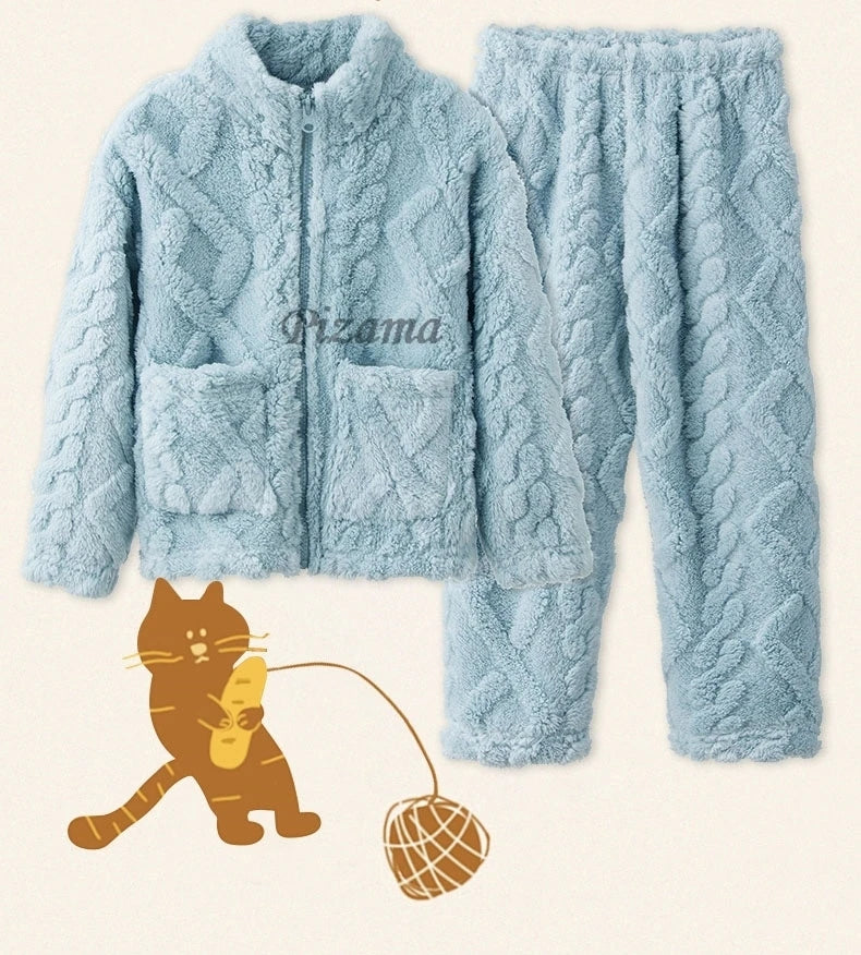 Light blue cable knit pajama set with 'Pizama' branding on a beige background.